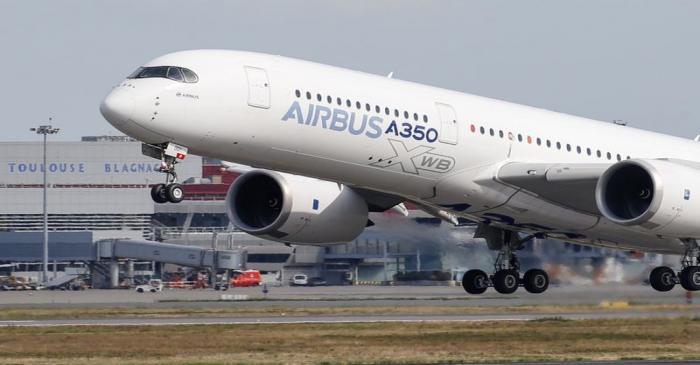 FILE PHOTO: An Airbus A350 takes off at the aircraft builder's headquarters in Colomiers near