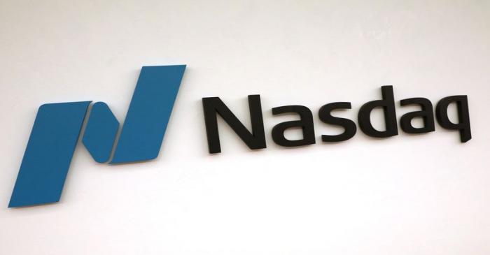 FILE PHOTO: The Nasdaq logo is displayed at the Nasdaq Market site in New York