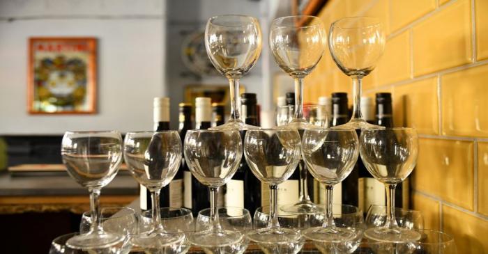 FILE PHOTO: Wine glasses are stacked inside The Greenwich Pensioner pub in London