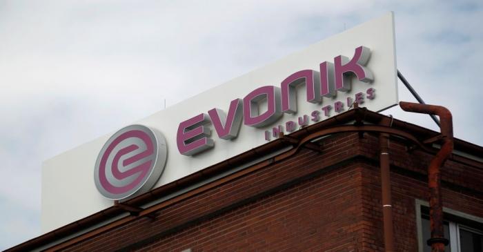 Logo of the specialty chemical manufacturer Evonik Industries is pictured at a factory in