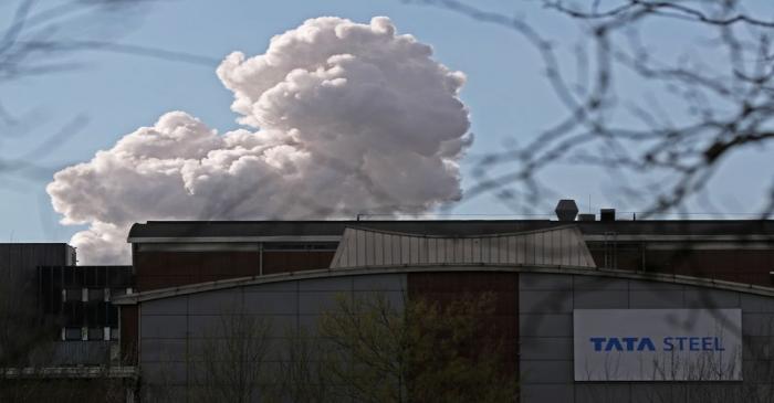 Smoke is seen coming out of a chimney at the Tata steel plant in Ijmuiden