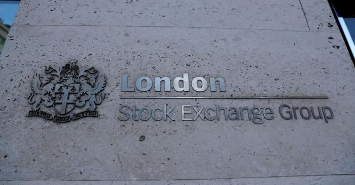 FILE PHOTO: Signage is seen outside the entrance of the London Stock Exchange in London