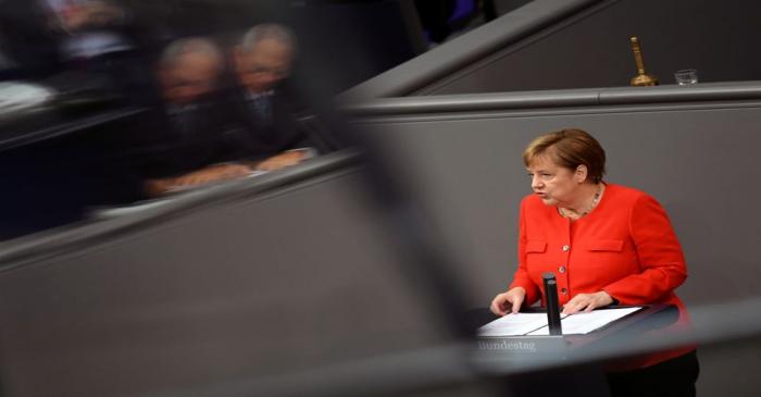 FILE PHOTO: German Chancellor Angela Merkel addresses the lower house of parliament Bundestag,