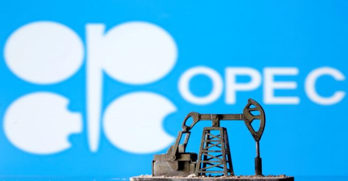 FILE PHOTO: A 3D printed oil pump jack in front of the OPEC logo in this illustration picture