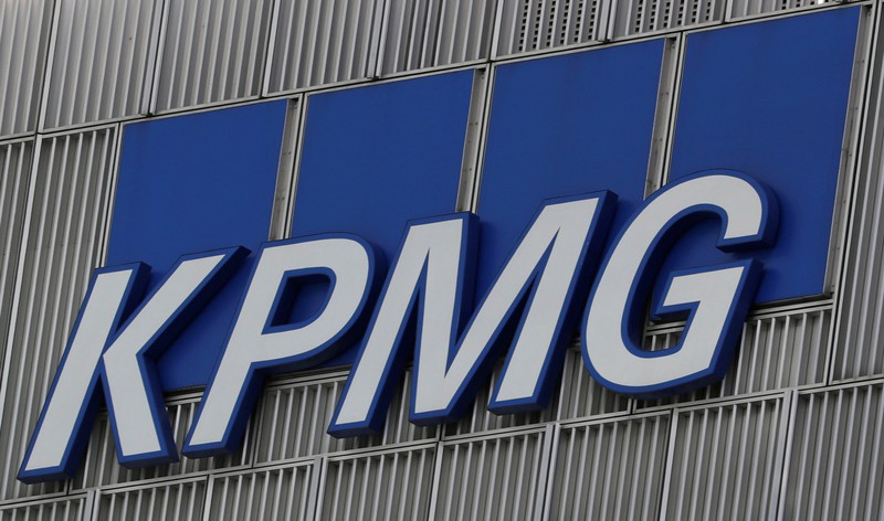 FILE PHOTO: The KPMG logo is seen at their offices at Canary Wharf financial district in London