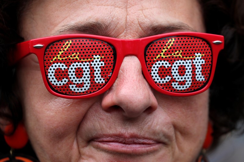 FILE PHOTO: A French CGT trade union member takes part in a demonstration of public sector