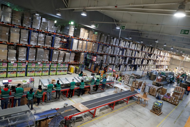 Employees work at the Science4You factory in Lisbon