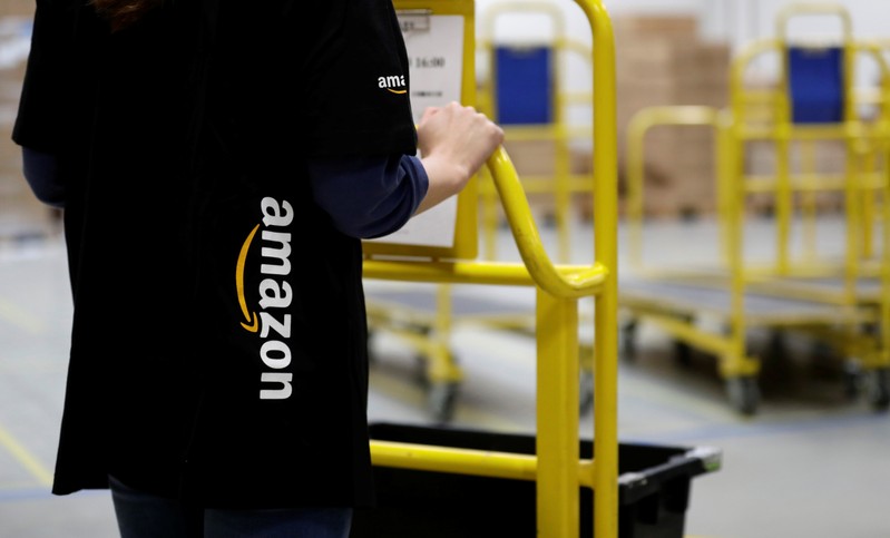 An employee works at the Amazon fulfillment center in the village of Dobroviz, near Prague