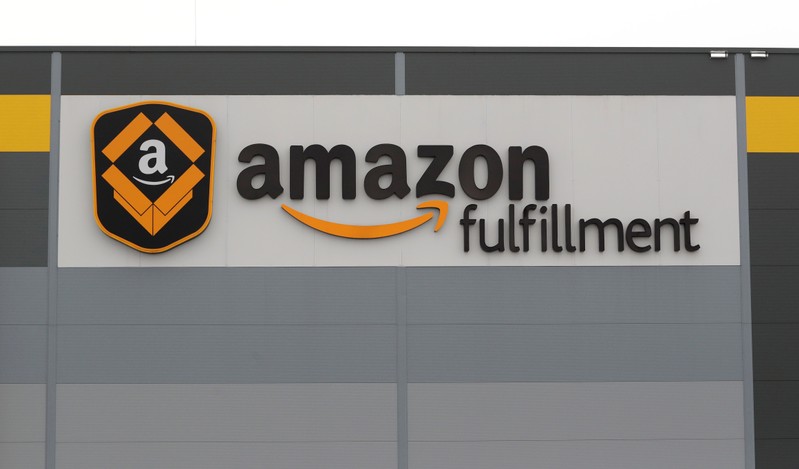 A logo of the Amazon fulfillment is seen outside the Amazon fulfillment center in the village