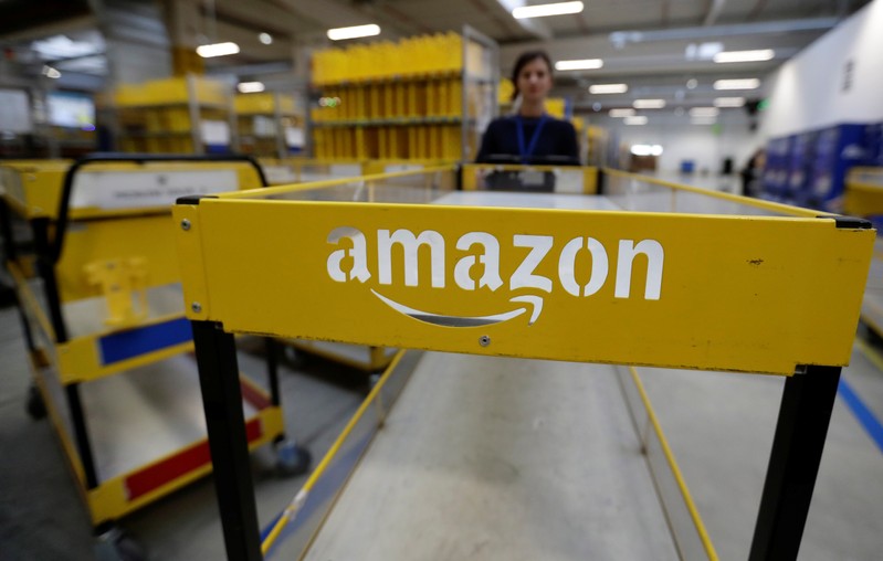 An employee works at the Amazon fulfillment center in the village of Dobroviz, near Prague