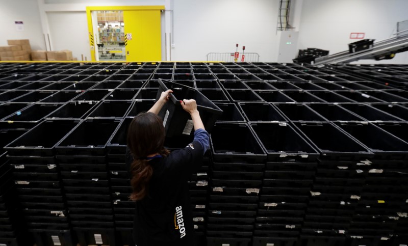 An employee works at the Amazon fulfillment center in the village of Dobroviz, near Prague