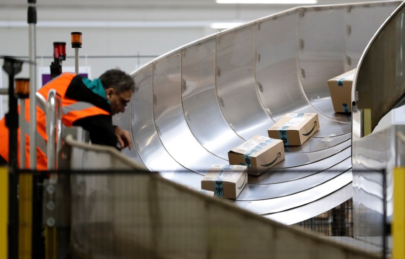 An employee works at the Amazon fulfillment center in the village of Dobroviz, near Prague