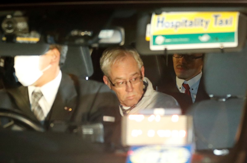 Greg Kelly, the former deputy of ousted Nissan chairman Carlos Ghosn, is seen in the car, as he