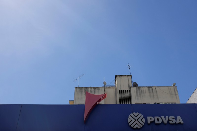 FILE PHOTO: The corporate logo of the Venezuelan state-owned oil company PDVSA is seen at a gas