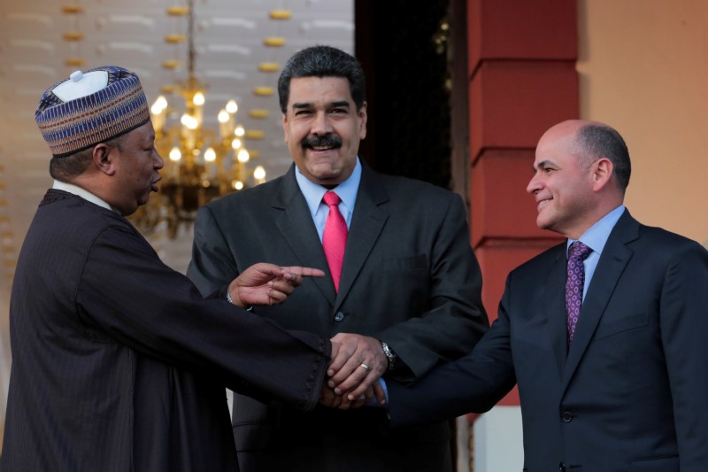 FILE PHOTO: OPEC Secretary General Mohammed Barkindo, Venezuela's President Nicolas Maduro and