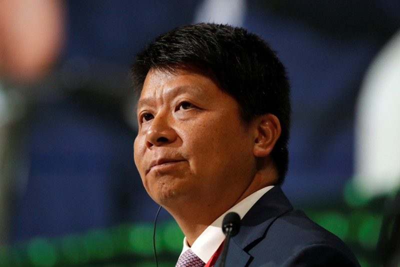 FILE PHOTO:  Guo Ping, Rotating Chief Executive Officer of Huawei Technologies company, attends