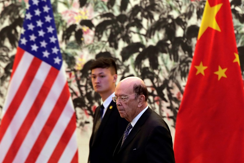 U.S. Commerce Secretary Wilbur Ross arrives to the Diaoyutai State Guesthouse to attend a