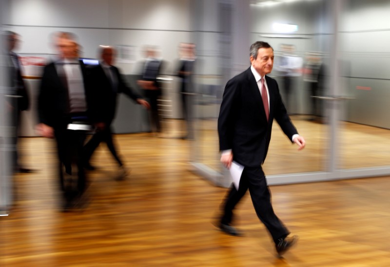 European Central Bank (ECB) President Mario Draghi arrives to hold a news conference, in