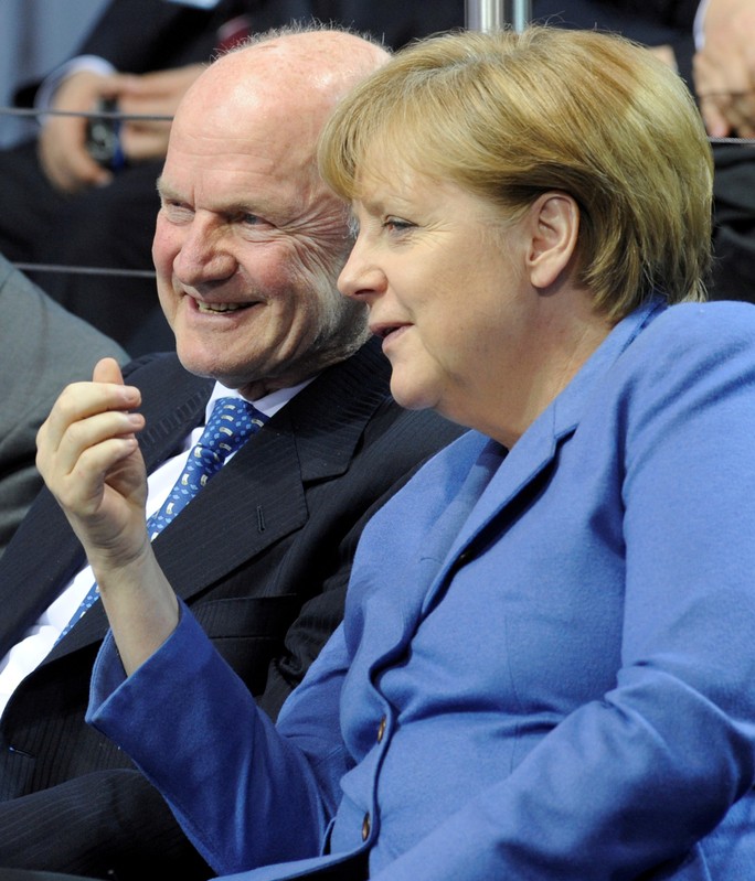 FILE PHOTO: German Chancellor Merkel chats with Piech, chairman of the supervisory board of