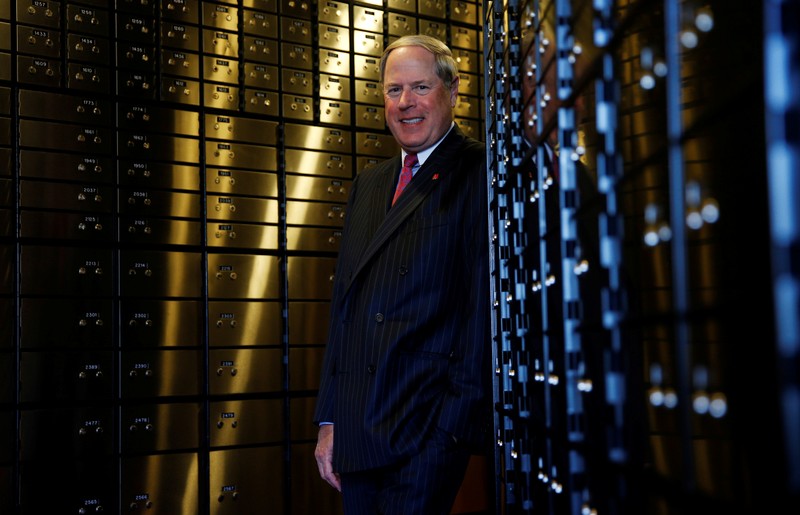 FILE PHOTO: Metro Bank Chairman Vernon Hill poses for a photograph in the vault of their new