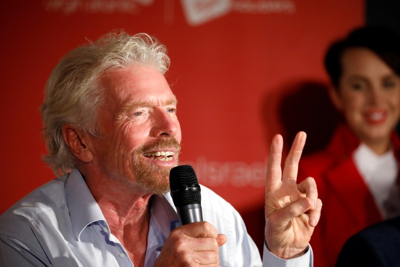 Virgin's Richard Branson attends a news conference after landing at the Ben Gurion