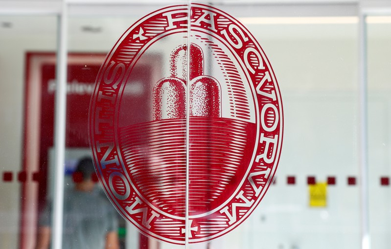 FILE PHOTO: The logo of Monte dei Paschi di Siena at a bank branch entrance in Rome