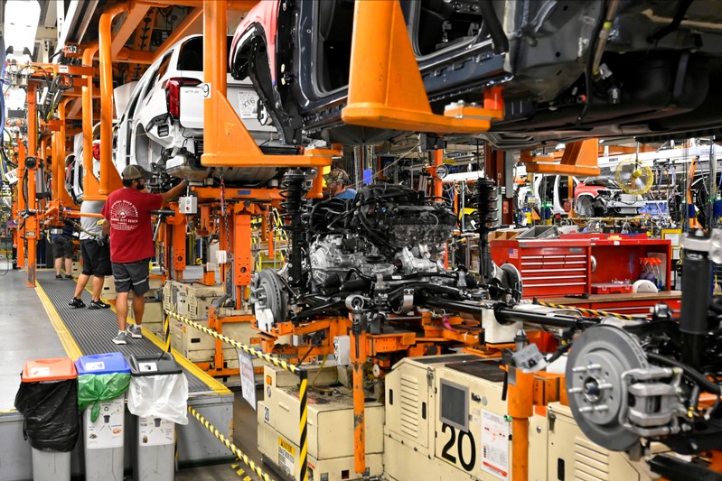 FILE PHOTO: FILE PHOTO: The engine and drive train are pictured with the body on the assembly