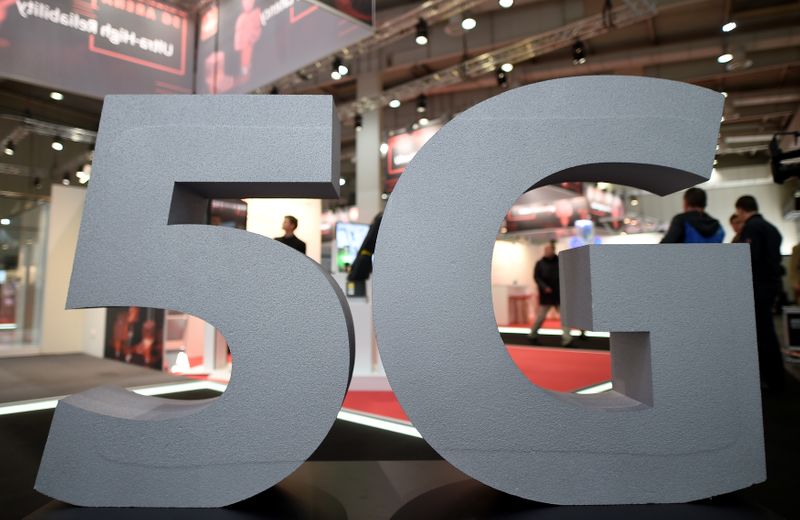 FILE PHOTO: A logo of the upcoming mobile standard 5G is pictured at the Hanover trade fair, in