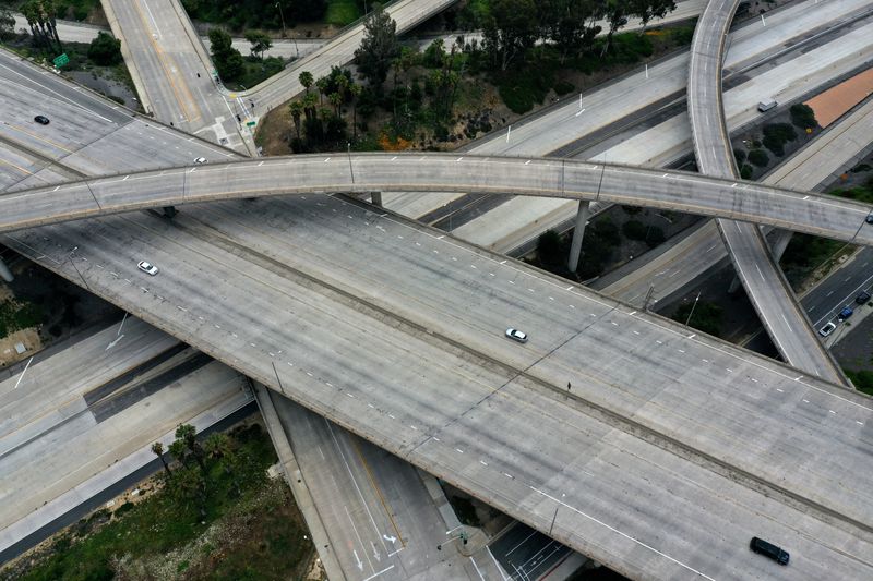 FILE PHOTO: An empty freeway intersection is seen two days before Earth Day, after Los