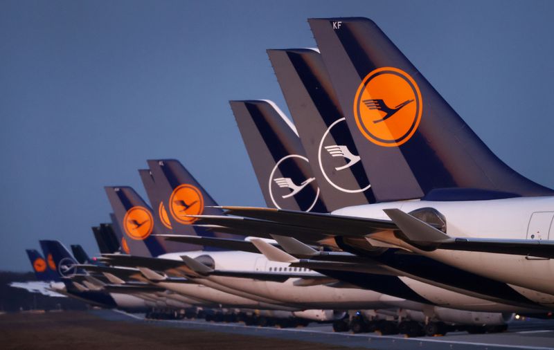 FILE PHOTO: Planes of German carrier Lufthansa parked on a closed runway at Frankfurt airport