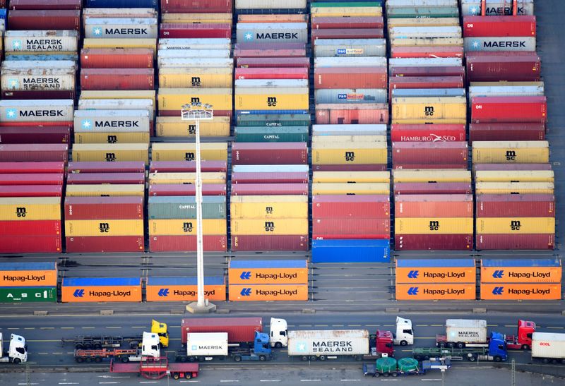 FILE PHOTO: Containers of Maersk, MSC and Hapag-Lloyd are seen at a terminal in the port of