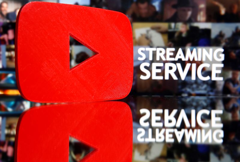 FILE PHOTO: A 3D-printed Youtube logo is seen in front of displayed 