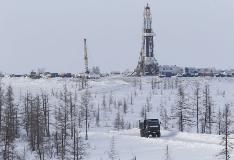 FILE PHOTO: A general view shows an oil derrick at the Rosneft company owned Suzunskoye oil