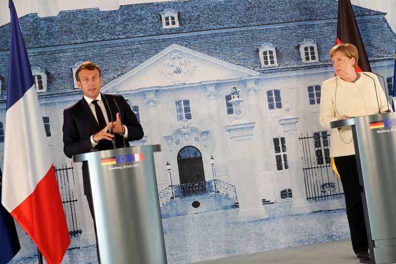 German Chancellor Angela Merkel and French President Emmanuel Macron meet at Meseberg castle